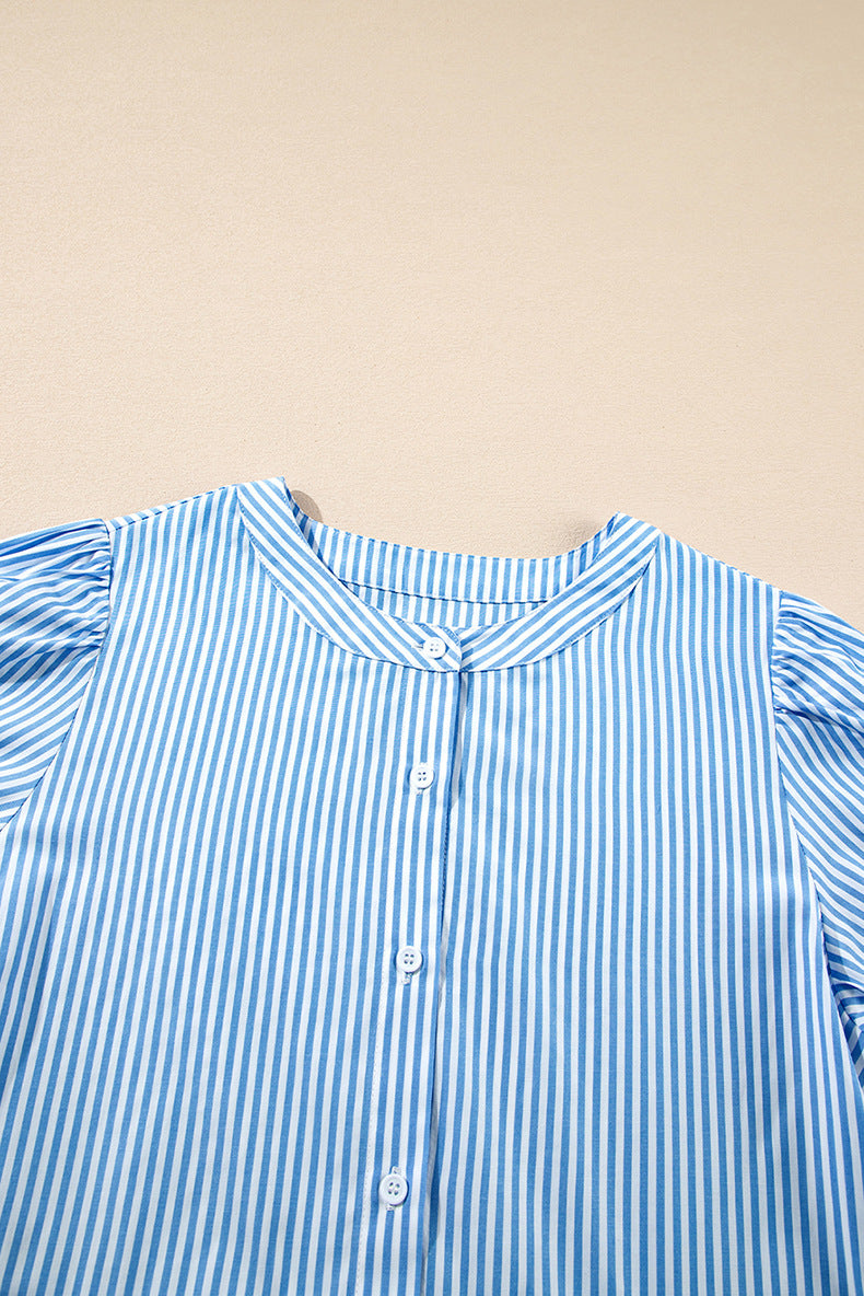 Blue and white striped shirt on a beige background