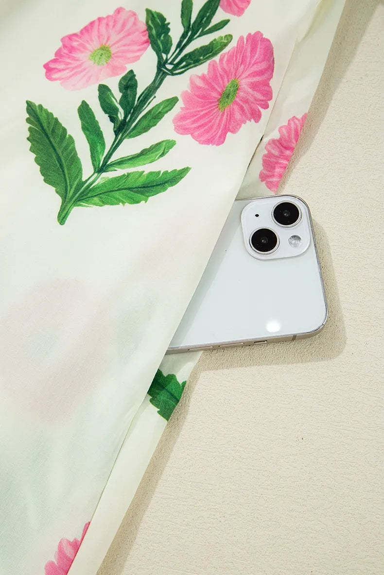Phone case with floral design on a light background