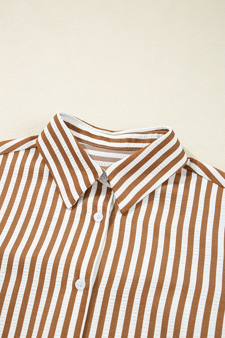 Brown and white striped shirt on a beige background